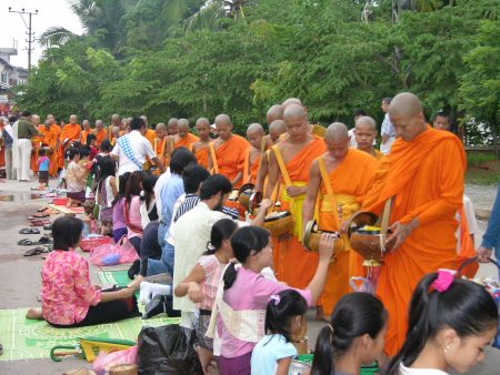 Arm giving monk Luangprabang
